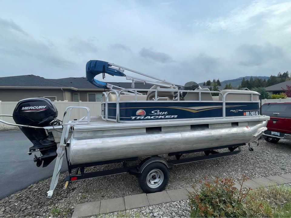 Float Fund — Mercury outboard and swim ladder